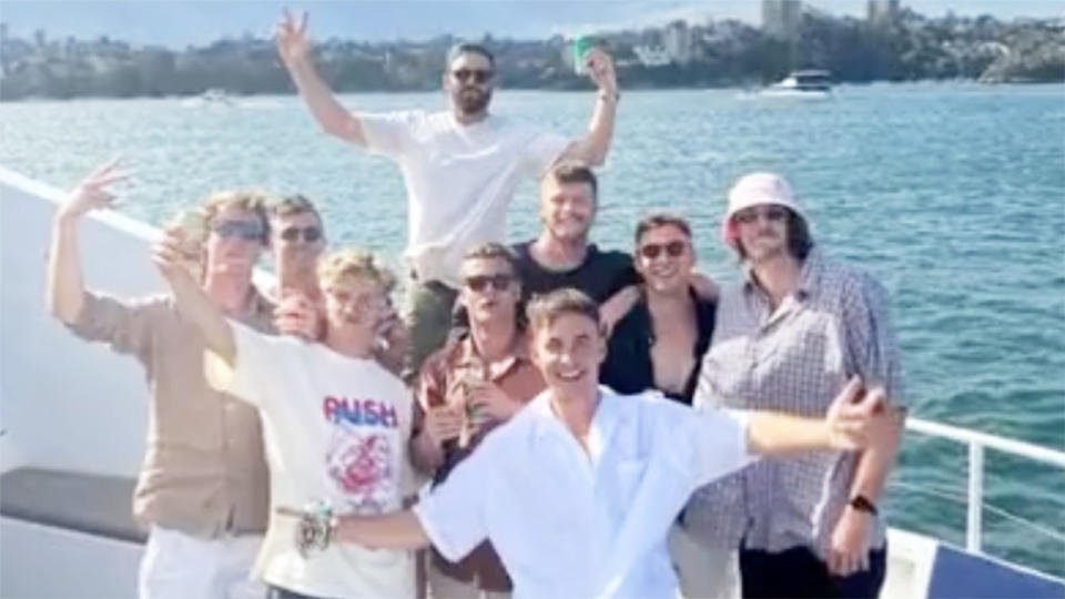 Sydney Swans players, pictured here attending a harbour cruise before the Covid outbreak.