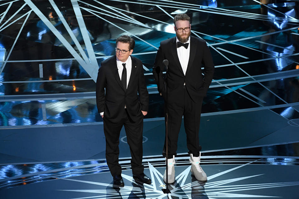 Michael J. Fox and Seth Rogen at the Academy Awards. (Photo: Getty Images)