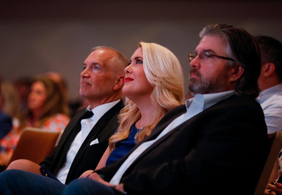 Springfield City Councilwoman Callie Carroll listens to the mayors State of the City address at Good Morning Springfield at Evangel University's Robert H. Spence Chapel on Thursday, June 1, 2023.