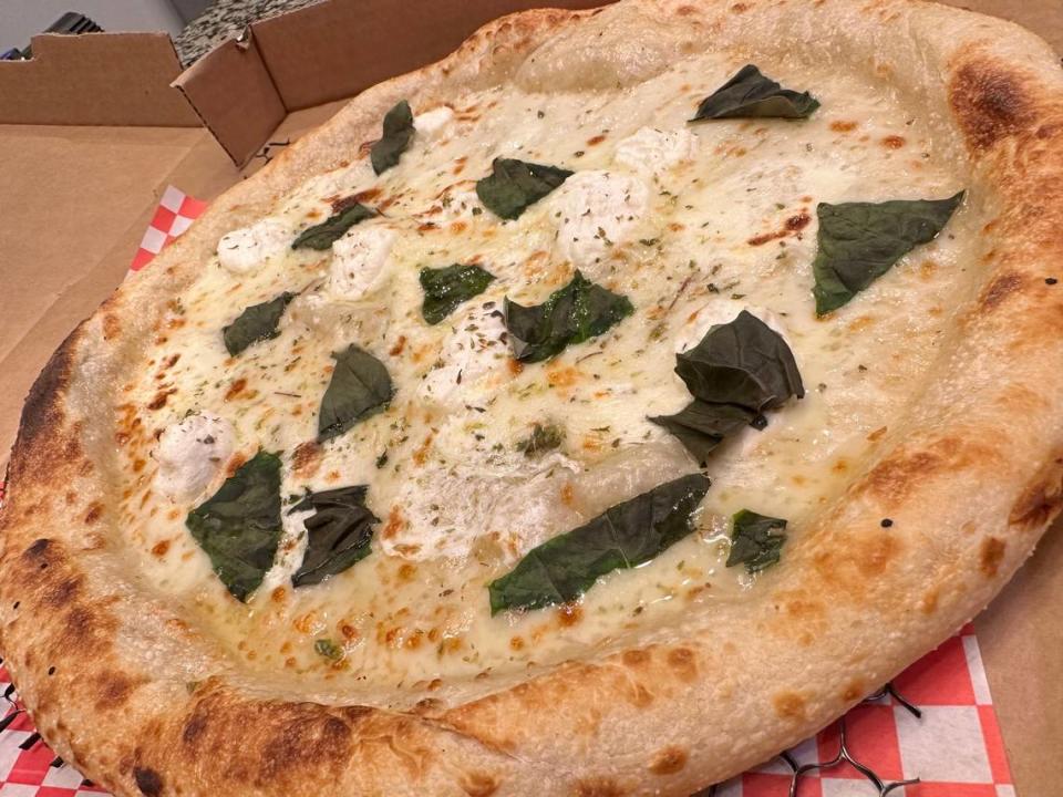 Wheelz Pizza’s White Pizza is made with garlic, parmesan cheese, ricotta cheese, organic Sicilian oregano, fresh basil, shredded mozzarella cheese and fresh mozzarella, over an extra virgin olive oil base.