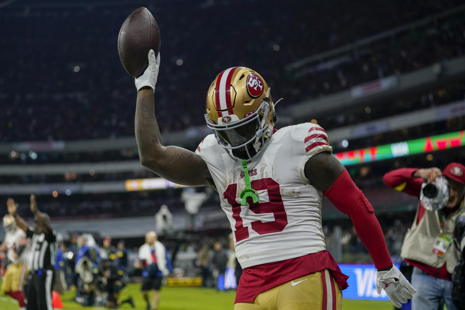 San Francisco 49ers wide receiver Deebo Samuel celebrates after scoring a touchdown during the second half of an NFL football game against the Arizona Cardinals, Monday, Nov. 21, 2022, in Mexico City. (AP Photo/Marcio Jose Sanchez)