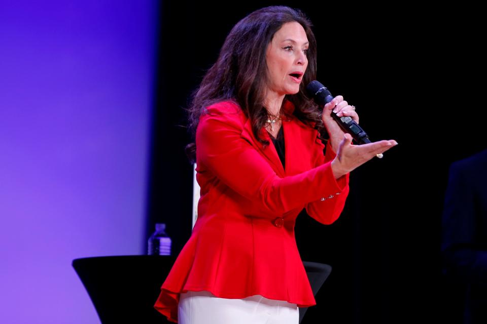 Mayoral candidate Carol Hefner speaks during Tuesday's debate.