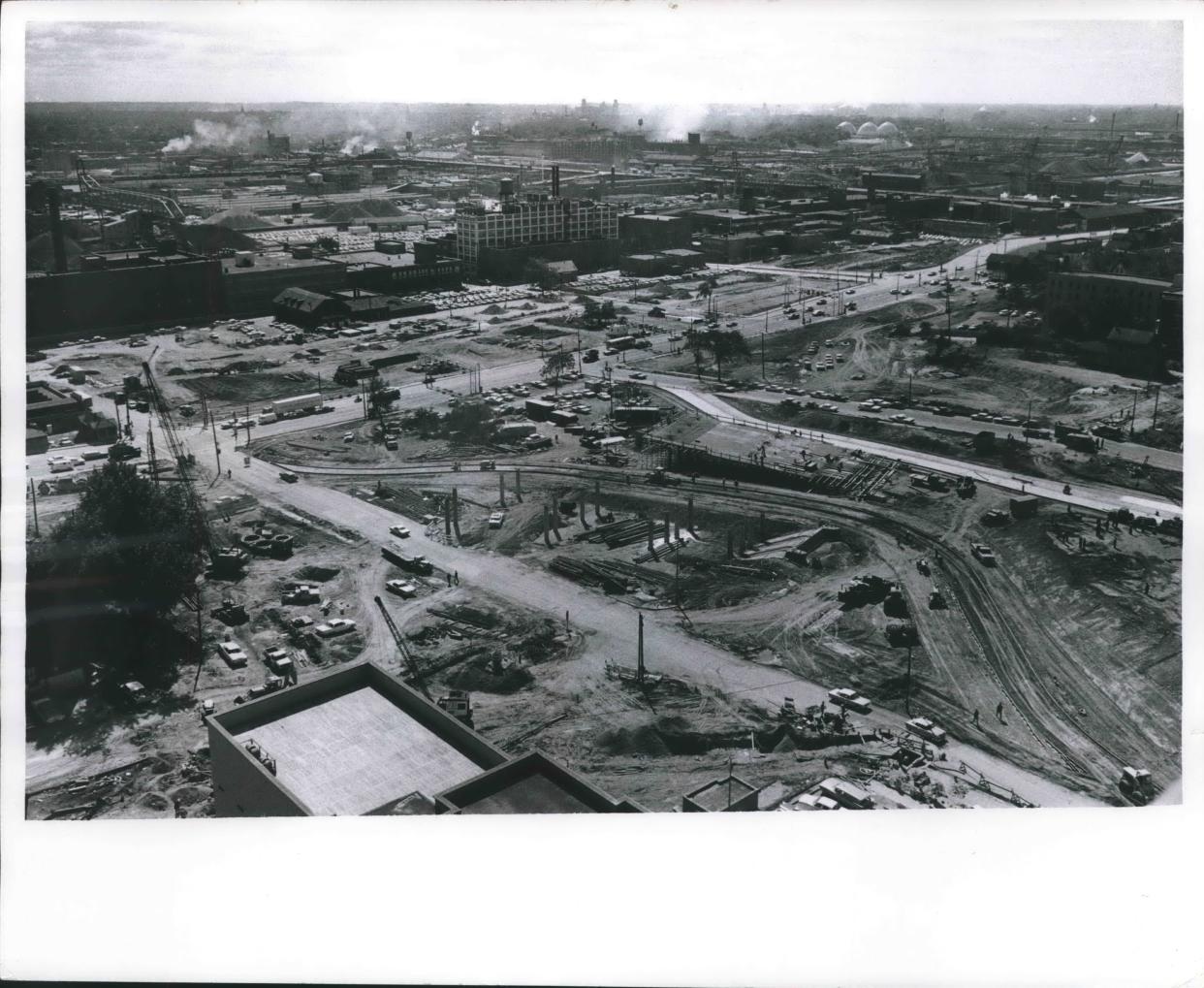 One of Milwaukee's oldest neighborhoods begins to look more like a desert as demolition picks up for the Marquette Interchange project in late 1964. This is the area south of W. Wisconsin Avenue and west of N. Ninth Street; the dirt road that was N. 10th St. runs from upper left to lower right. This photo was published in the Sept. 16, 1964, Milwaukee Journal.