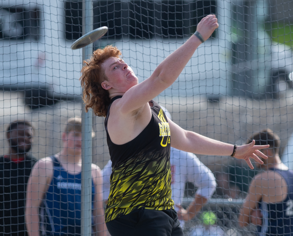 Garfield senior Jon Wiczen competes in the discus at the Wildcat Invitational.