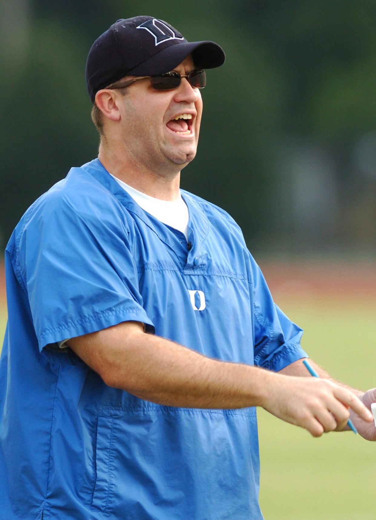 New Duke offensive coordinator Bill O'Brien yells at his offense during a scrimmage Tuesday, Aug. 23, 2005, at Wallace Wade Stadium on the campus of Duke University in Durham, N.C. O'Brien is the third offensive coordinator in the past three years at Duke. (AP Photo/Stan Gilliland)