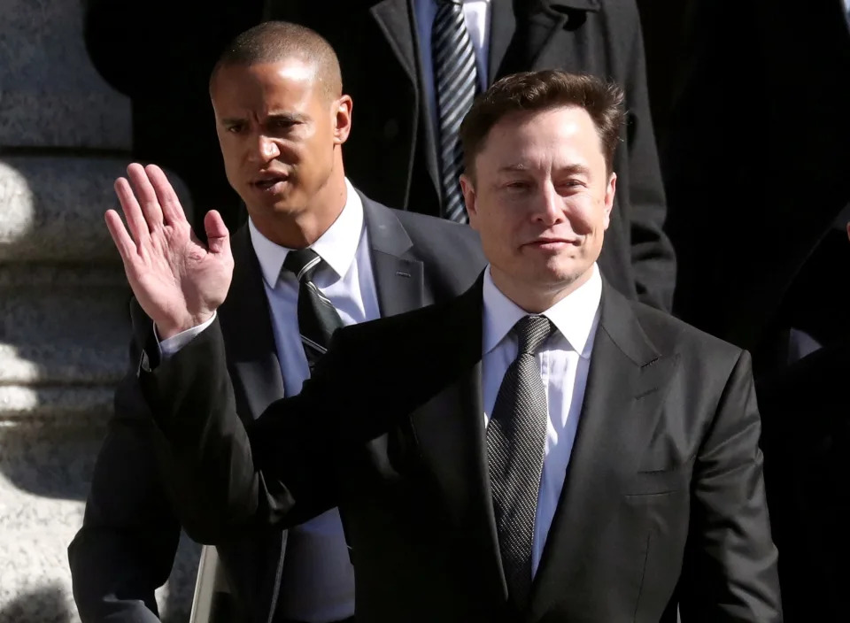 Tesla CEO Elon Musk waving.