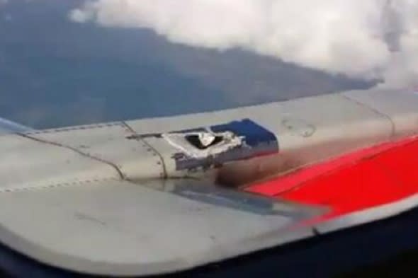 Mexico plane's engine hole patched up with tape - which then peels off