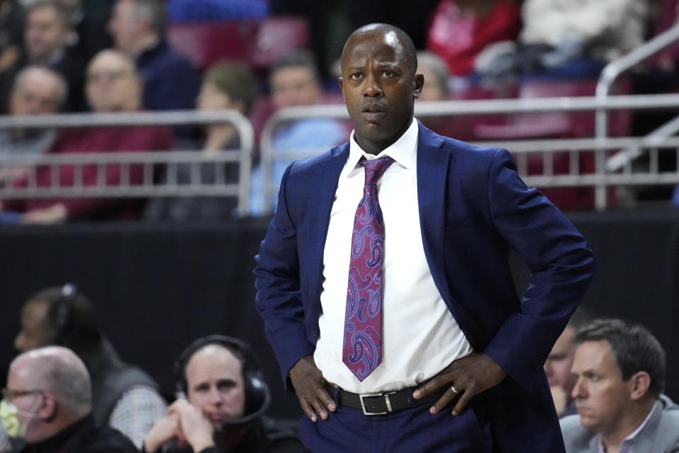 FILE - Boston College head coach Earl Grant watches the first half of an NCAA college basketball game against Notre Dame, Jan. 3, 2023, in Boston. Quinten Post was the biggest contributor for Grant last season, when the Eagles flirted with .500 after winning 13 games the year before (and four in the pandemic-shortened season before he arrived). (AP Photo/Charles Krupa, File)