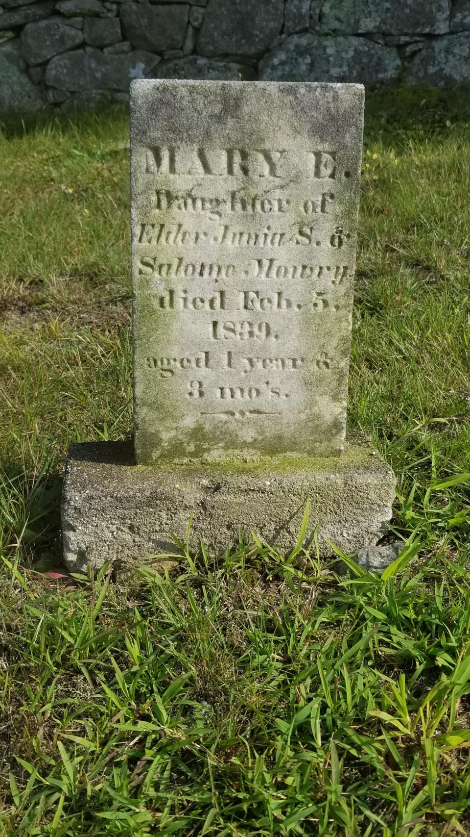 The grave of Mary Elizabeth Mowry, at Pleasant View Cemetery in Tiverton, Rhode Island. She was the daughter of Salome Lincoln Mowry; her mother wished to be buried with her child.