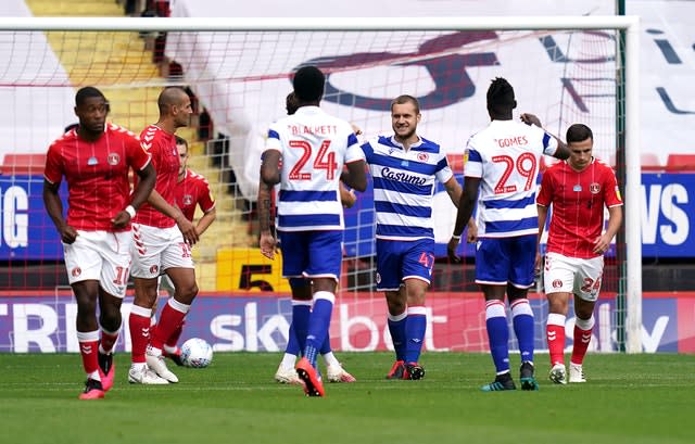 Reading’s George Puscas, centre, netted from the penalty spot at Charlton