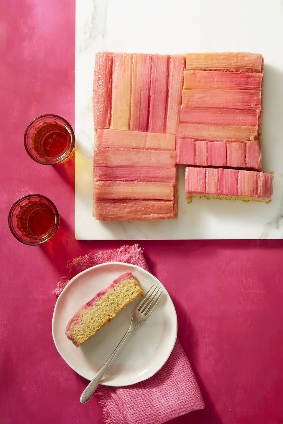 <p>Made with rhubarb and orange juice, this refreshing pink cake is the perfect dessert for spring.</p><p>Get the <strong><a href="https://www.womansday.com/food-recipes/food-drinks/a19810598/rhubarb-and-almond-upside-down-cake-recipe/" rel="nofollow noopener" target="_blank" data-ylk="slk:Rhubarb and Almond Upside-Down Cake recipe.;elm:context_link;itc:0;sec:content-canvas" class="link ">Rhubarb and Almond Upside-Down Cake recipe.</a></strong></p>