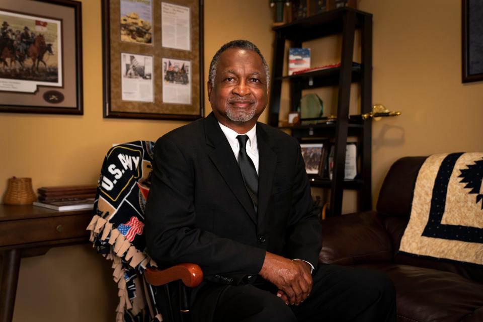 Retired Army colonel Dwayne Wagner poses in his home Wednesday, June 5, 2024. Wagner wrote the poem titled "Juneteenth: A Freedom's Journey 1619-2123" for Military Review.