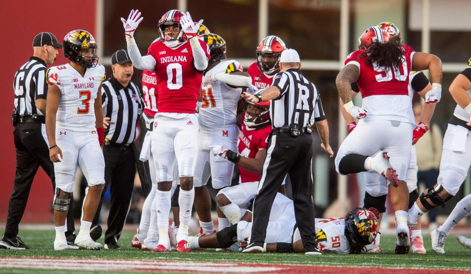 Indiana's Dasan McCullough (0) celebrates his tackle of Maryland's Antwaine Littleton II (31) during the Indiana versus Maryland football game at Memorial Stadium on Saturday, Oct. 15, 2022.