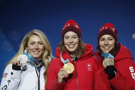 Medals Ceremony - Alpine Skiing - Pyeongchang 2018 Winter Olympics - Women's Alpine Combined - Medals Plaza - Pyeongchang, South Korea - February 22, 2018 - Gold medalist Michelle Gisin of Switzerland, silver medalist Mikaela Shiffrin of the U.S. and bronze medalist Wendy Holdener of Switzerland on the podium. REUTERS/Kim Hong-Ji