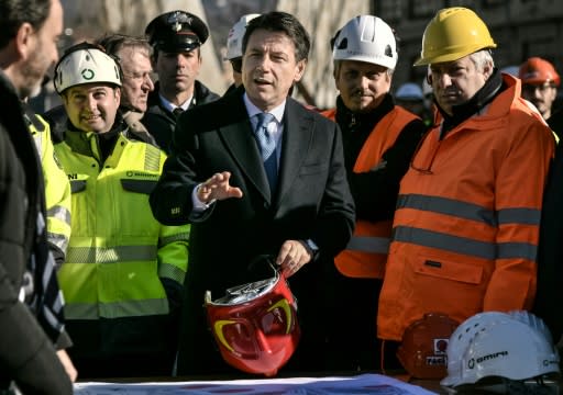 Italy?s Prime Minister Giuseppe Conte visited the site Friday as the work began to dismantle the Genoa bridge