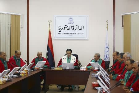 President of Libya's Supreme Court Kamal Edhan (C) chairs a hearing to discuss the legitimacy of Prime Minister Ahmed Maiteeq in Tripoli June 9, 2014. REUTERS/Stringer