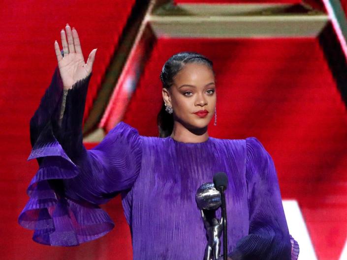 Robyn Rihanna Fenty accepts an award from the NAACP in February 2020 (Rich Fury/Getty Images)