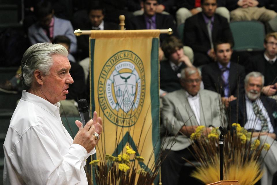 A.J. Smith, former San Diego Chargers general manager, speaks to students at his alma mater, Bishop Hendricken High School, in 2013.
