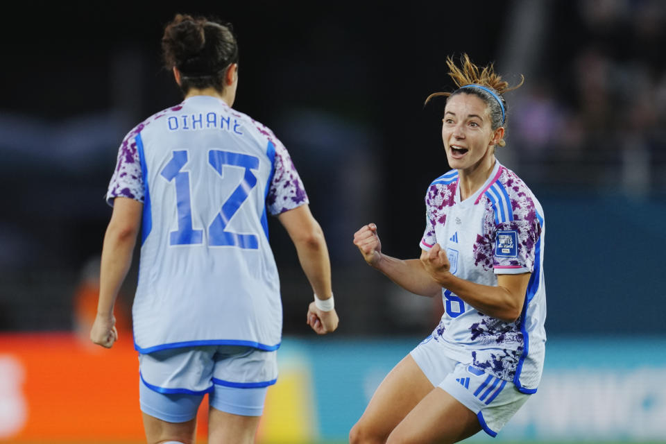 Spain's Aitana Bonmati,right, reacts with teammate Alba Redondo after scoring her team's third goal during the Women's World Cup second round soccer match between Switzerland and Spain at Eden Park in Auckland, New Zealand, Saturday, Aug. 5, 2023. (AP Photo/Abbie Parr)