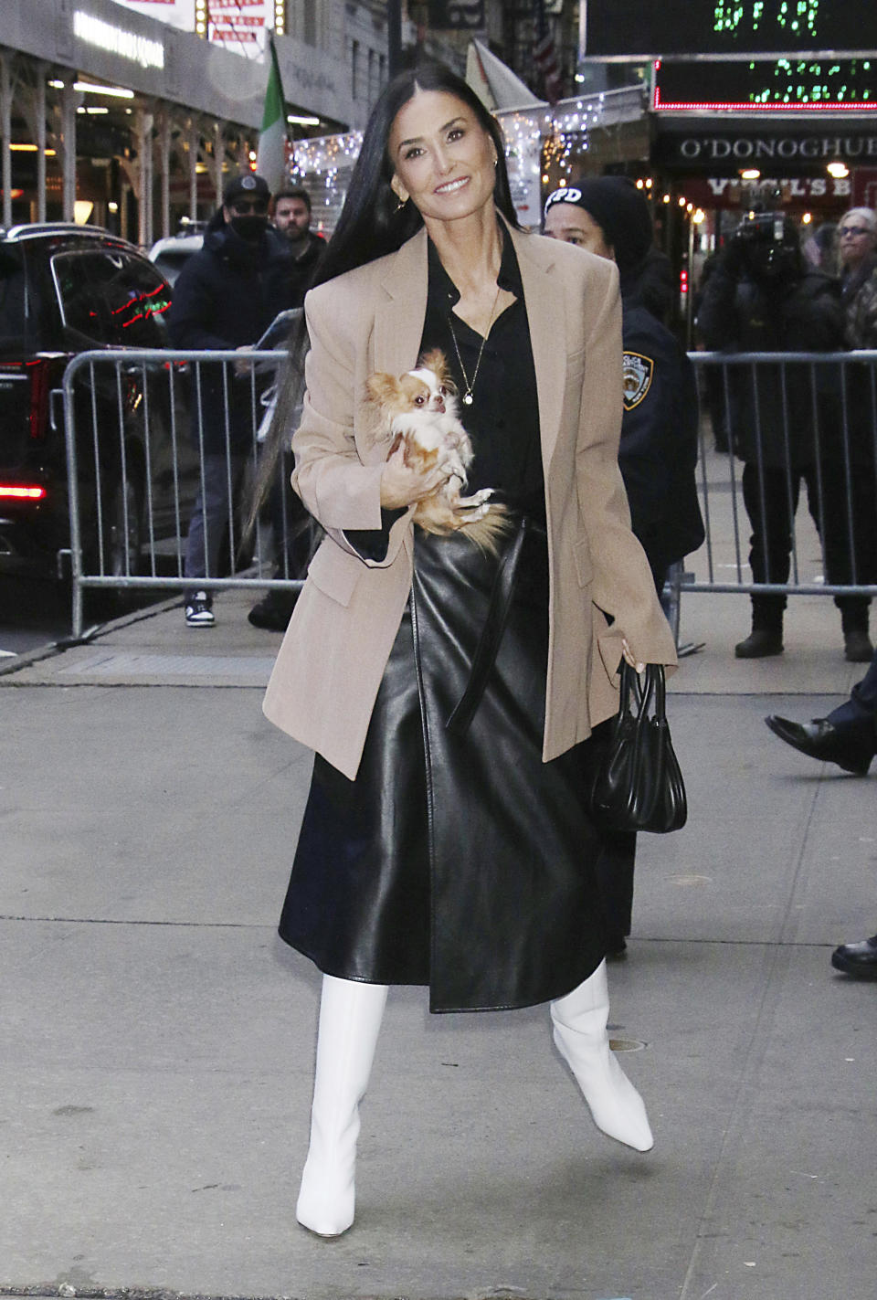 Moore holds Pilaf outside the Good Morning America studio.