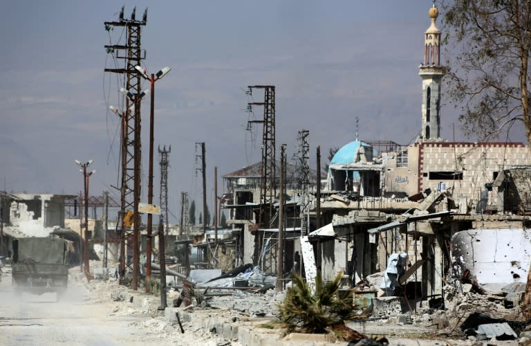 Syrian regime forces enter the formerly rebel-held village of Utaya in Eastern Ghouta on March 5, 2018