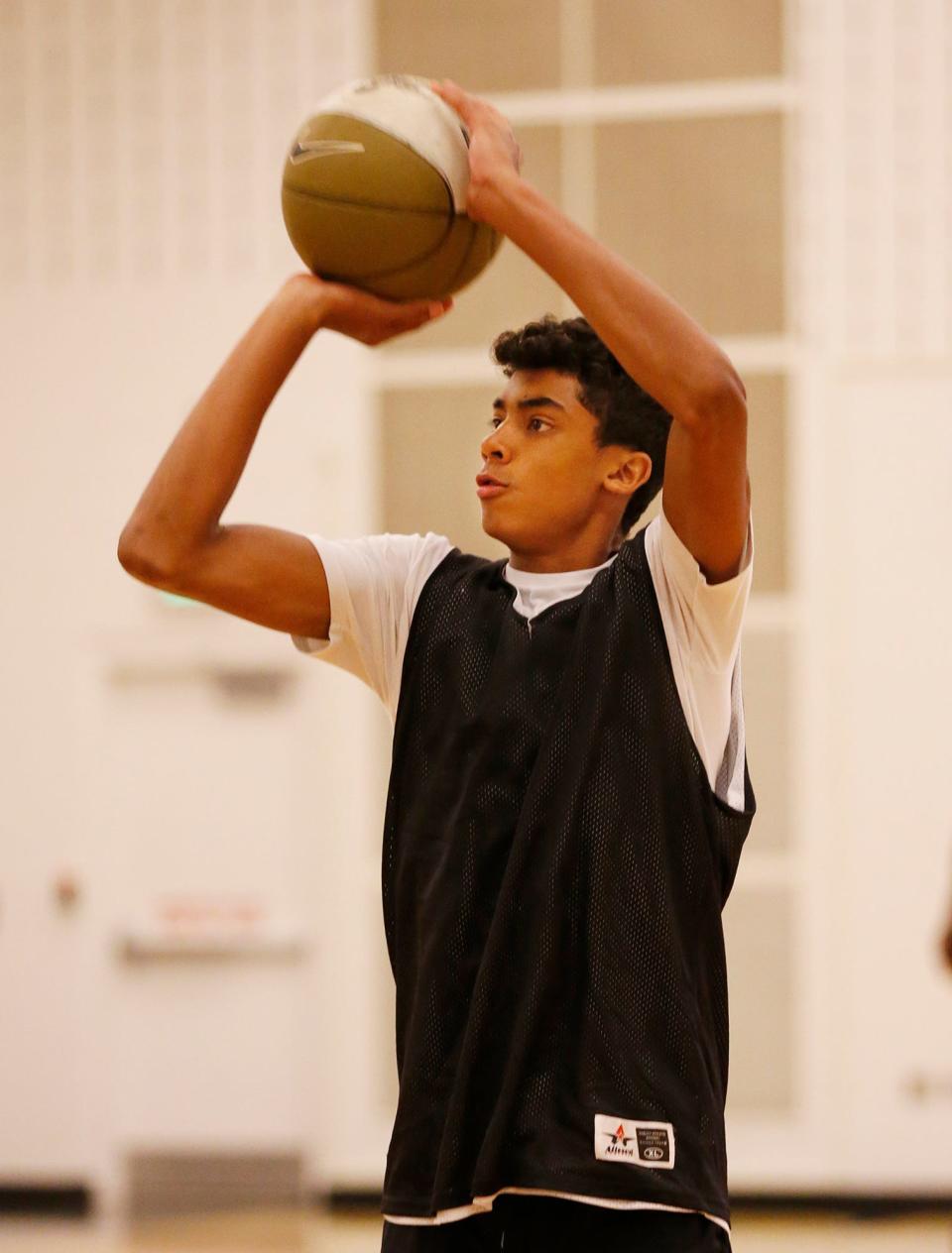 Max Christie of Homes Jr. High with a shot during the Purdue Elite Basketball Camp Saturday, August 25, 2018, at the France A. Cordova Recreational Sports Center.