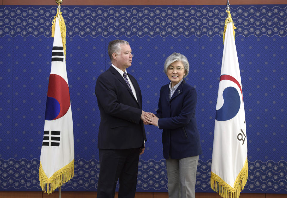 U.S. Special Representative for North Korea Stephen Beigun, left, and South Korean Foreign Minister Kang Kyung-wha shake hands during their meeting at Foreign Ministry in Seoul Saturday, Feb. 9, 2019. Beigun returned from three days of talks in Pyongyang, North Korea, before the second summit between U.S. President Donald Trump and North Korean leader Kim Jong Un in Vietnam later this month. (Ed Jones/Pool Photo via AP)