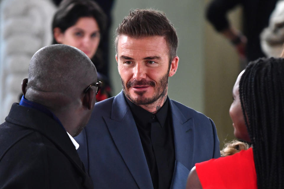 LONDON, ENGLAND - FEBRUARY 16: David Beckham and Edward Enninful attend the Victoria Beckham show during London Fashion Week February 2020 on February 16, 2020 in London, England. (Photo by Gareth Cattermole/BFC/Getty Images for BFC)