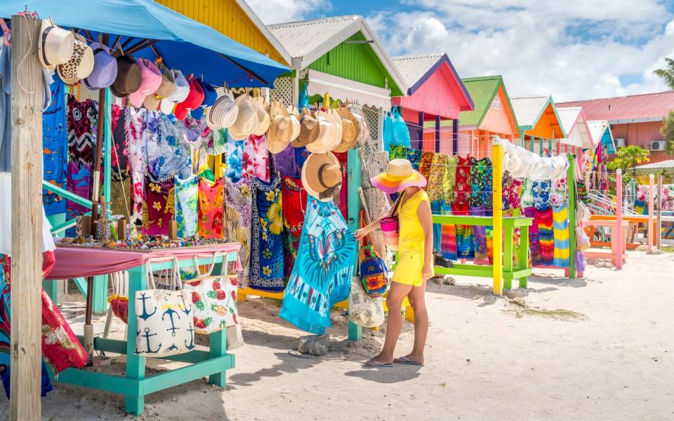 Market stalls on Long Bay Beach, Antigua - Roberto Moiola / Sysaworld