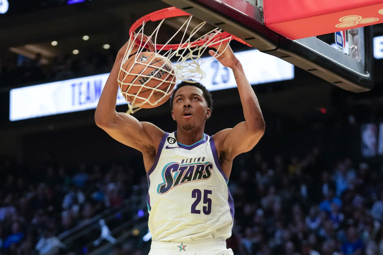 Trey Murphy III, of the New Orleans Pelicans, dunks during an NBA Rising Stars semifinal basketball game on Feb. 17, 2023, in Salt Lake City. (AP Photo/Rick Bowmer)