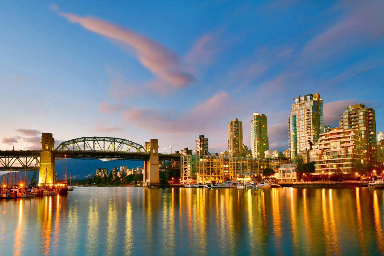 Beautiful view of Vancouver BC with harbor at sunset, Canada