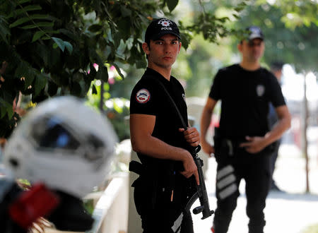 Police officers patrol outside the home of U.S. pastor Andrew Brunson in Izmir, Turkey August 17, 2018. REUTERS/Osman Orsal