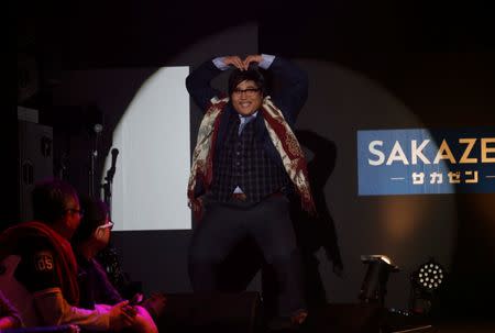 A model poses on the runway during Tokyo Pocchari collection, Japan's first fashion show for plump men in Tokyo. REUTERS/Kim Kyung-Hoon