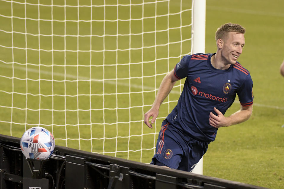 Chicago Fire forward Robert Beric (27) in celebrates his goal against the New England Revolution during the first half of an MLS soccer match in Chicago, Saturday, April 17, 2021. (AP Photo/Mark Black)
