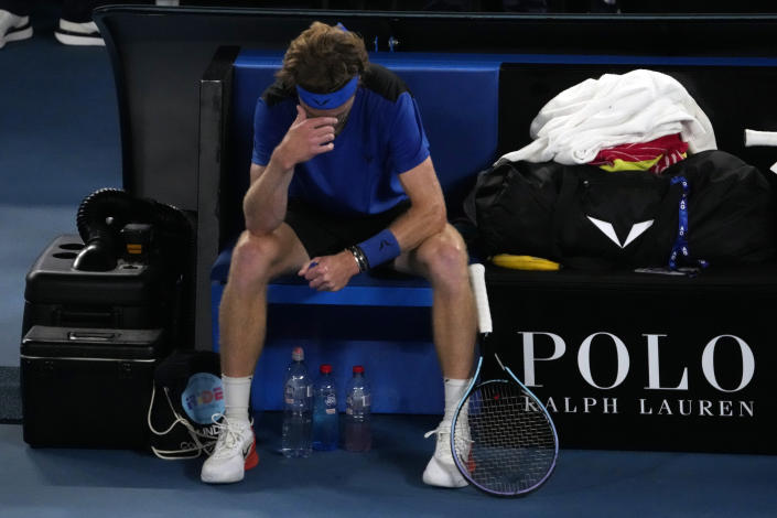 Andrey Rublev of Russia reacts during his quarterfinal against Novak Djokovic of Serbia at the Australian Open tennis championship in Melbourne, Australia, Wednesday, Jan. 25, 2023. (AP Photo/Ng Han Guan)