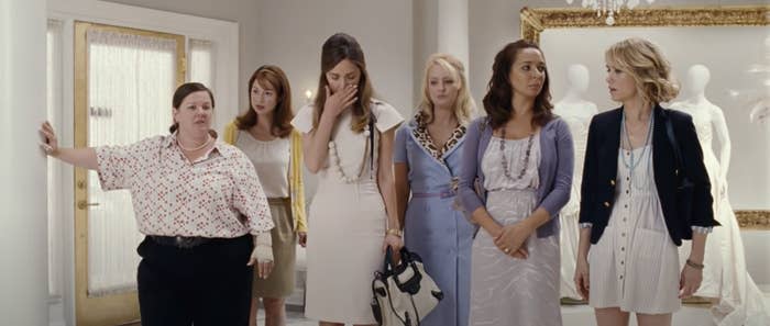 The cast of "Bridesmaids" in a bridal store