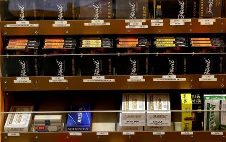 Boxes containing ammunition of different types are seen at Wyss Waffen gun shop in the town of Burgdorf, Switzerland August 10, 2016. REUTERS/Arnd Wiegmann