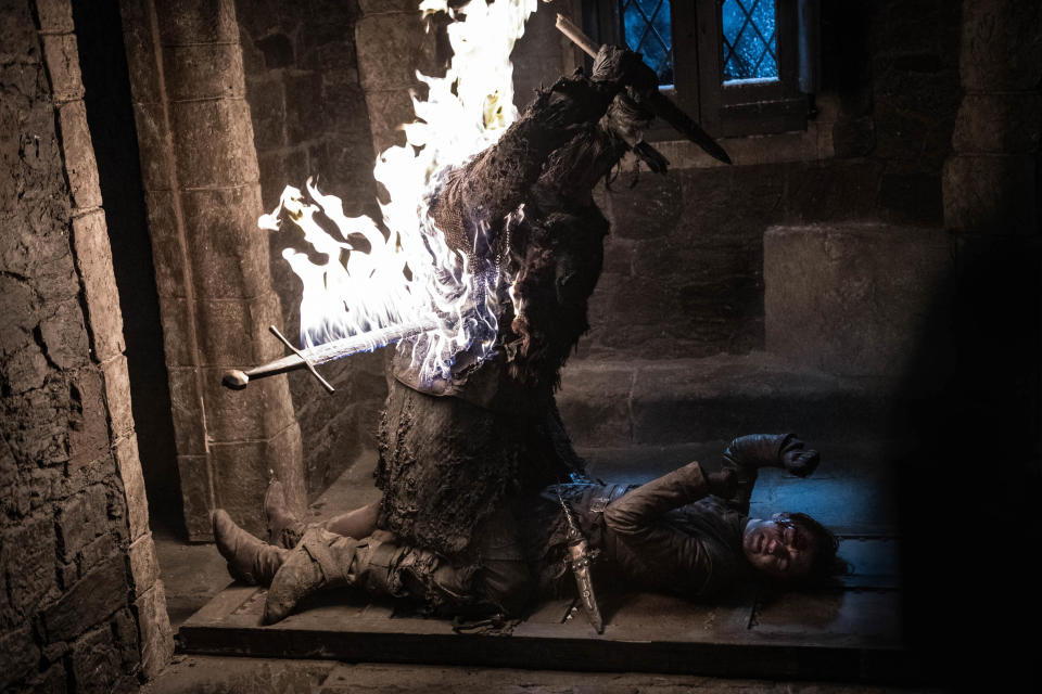 This image released by HBO shows Maisie Williams, right, in a scene from "Game of Thrones," that aired Sunday, April 28, 2019. In the Associated Press' weekly "Wealth of Westeros" series, we're following the HBO fantasy show's latest plot twists and analyzing the economic and business forces driving the story. This week, Arya’s triumphant assassination of the king ice zombie has prompted an appreciation among us for the role of skills, in economics as well as medieval Westeros. (Helen Sloan/HBO via AP)
