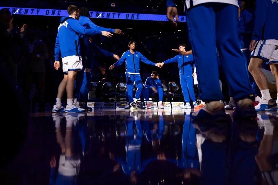 Kentucky Wildcats guard D.J. Wagner (21) is introduced before facing Marshall during the game at Rupp Arena in Lexington, Ky, Friday, November 24, 2023.