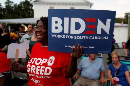 Azalee Williams of Florence, South Carolina, reacts to the speech of Democratic U.S. presidential candidate and former Vice President Joe Biden during the 2019 Presidential Galivants Ferry Stump Meeting in Gallivants Ferry