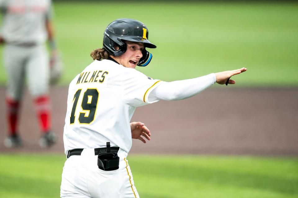 Iowa’s Ben Wilmes reacts after getting walked during a NCAA Big Ten Conference baseball game against <a class="link " href="https://sports.yahoo.com/ncaaf/teams/ohio-st/" data-i13n="sec:content-canvas;subsec:anchor_text;elm:context_link" data-ylk="slk:Ohio State;sec:content-canvas;subsec:anchor_text;elm:context_link;itc:0">Ohio State</a>, Friday, May 5, 2023, at Duane Banks Field in Iowa City, Iowa.