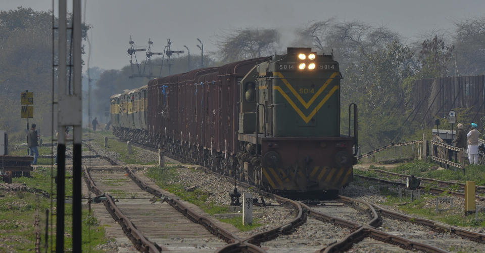 The Samjhauta Express train from Pakistan arrives in Atari, India, Monday, March 4, 2019. A Pakistani railway official said the key train service with neighboring India has resumed in another sign of easing tensions between the two nuclear-armed rivals since a major escalation last week over disputed Kashmir region. (AP Photo/Prabhjot Gill)