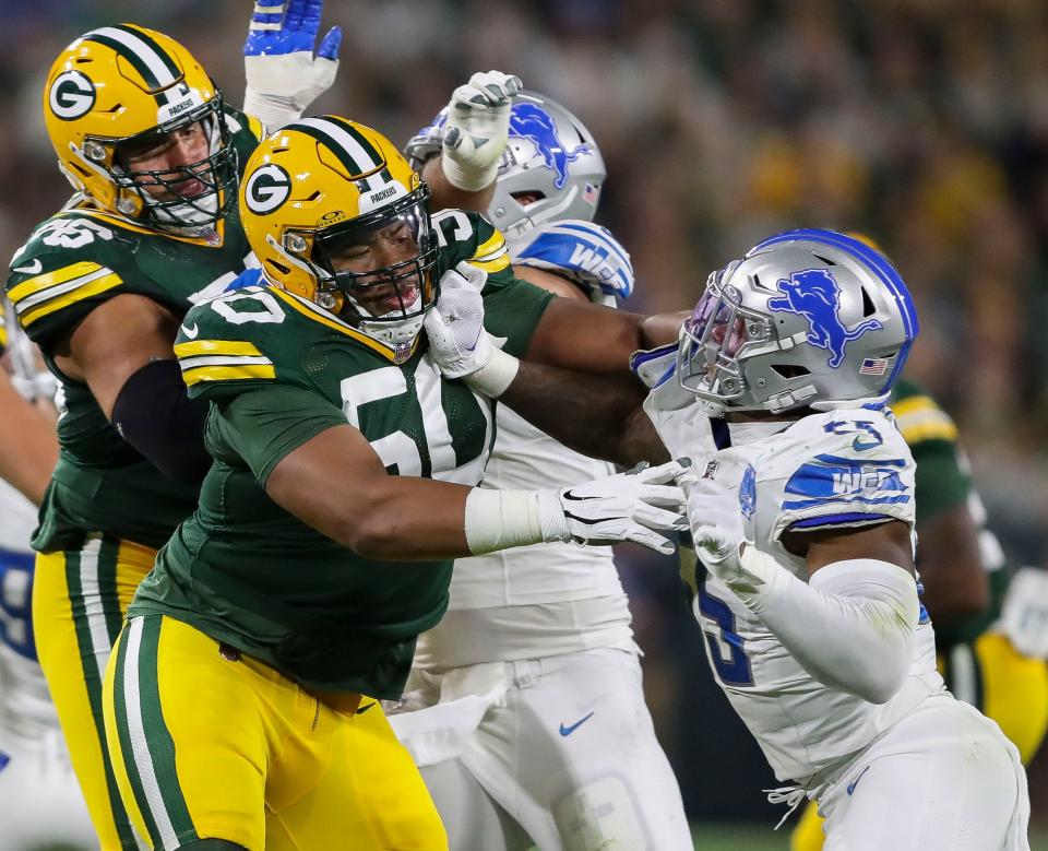 Green Bay Packers guard <a class="link " href="https://sports.yahoo.com/nfl/players/34096" data-i13n="sec:content-canvas;subsec:anchor_text;elm:context_link" data-ylk="slk:Zach Tom;sec:content-canvas;subsec:anchor_text;elm:context_link;itc:0">Zach Tom</a> (50) blocks <a class="link " href="https://sports.yahoo.com/nfl/teams/detroit/" data-i13n="sec:content-canvas;subsec:anchor_text;elm:context_link" data-ylk="slk:Detroit Lions;sec:content-canvas;subsec:anchor_text;elm:context_link;itc:0">Detroit Lions</a> linebacker <a class="link " href="https://sports.yahoo.com/nfl/players/33501" data-i13n="sec:content-canvas;subsec:anchor_text;elm:context_link" data-ylk="slk:Derrick Barnes;sec:content-canvas;subsec:anchor_text;elm:context_link;itc:0">Derrick Barnes</a> (55) during their football game on Thursday, September 28, 2023, at Lambeau Field in Green Bay, Wis.<br>Tork Mason/USA TODAY NETWORK-Wisconsin
