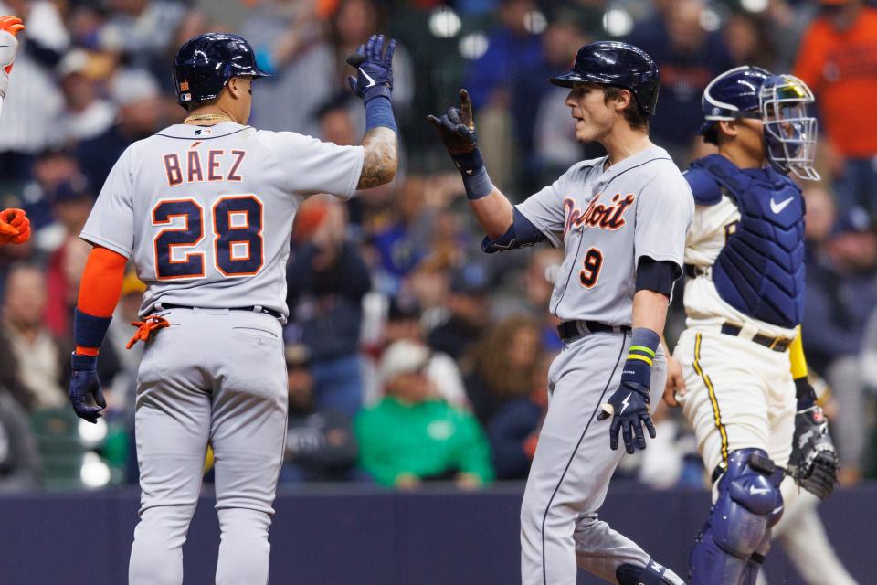 Tigers third baseman Nick Maton, right, is congratulated by shortstop Javier Báez after hitting a home run during the third inning against the Brewers on Monday, April 24, 2023,  in Milwaukee.