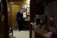 In this Tuesday, Oct. 30, 2012 photo, Dr. Russell Dohner makes a phone call in his office in Rushville, Ill. Even when the medical profession changed around him, he was always on call, ready to drop everything for a patient who might need him. (AP Photo/Jeff Roberson)