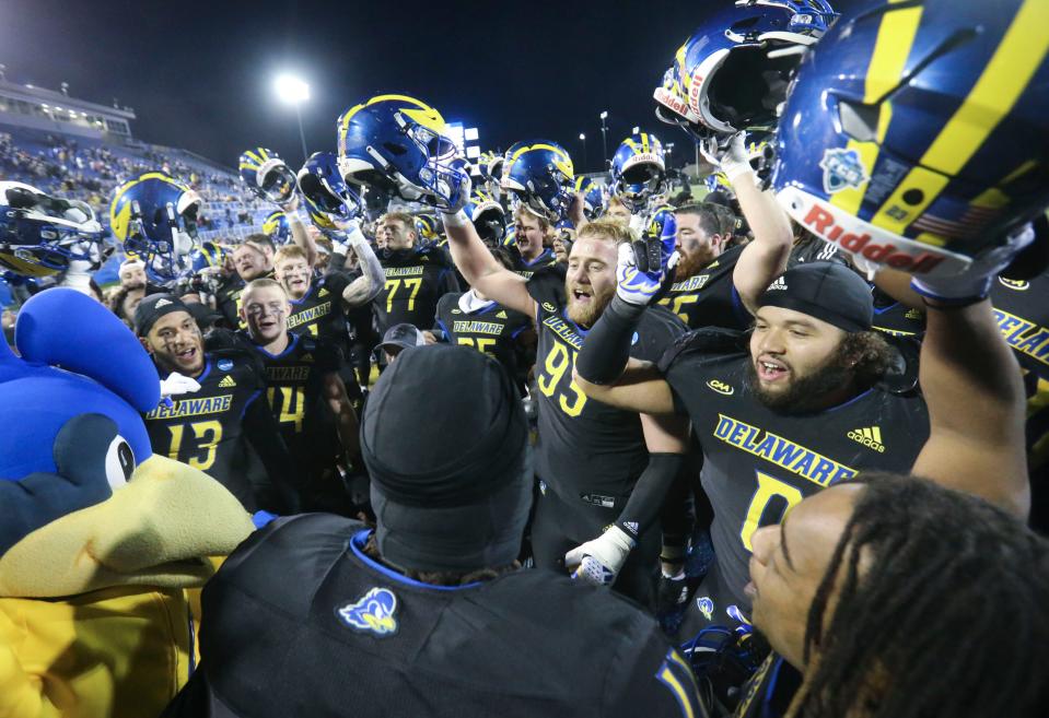 Delaware celebrates after the Blue Hens' 36-34 comeback win against Lafayette in the opening round of the NCAA FCS playoffs Saturday, Nov. 25, 2023 at Delaware Stadium.