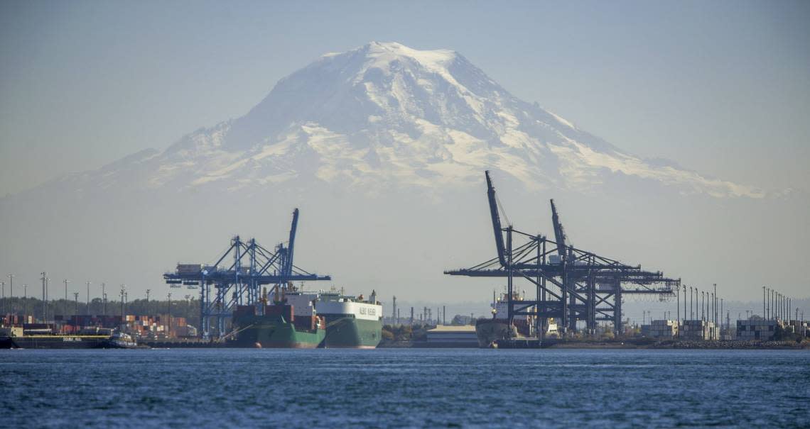 Mount Rainier looms over the Port of Tacoma, as seen from Commencement Bay, Sept. 26, 2018