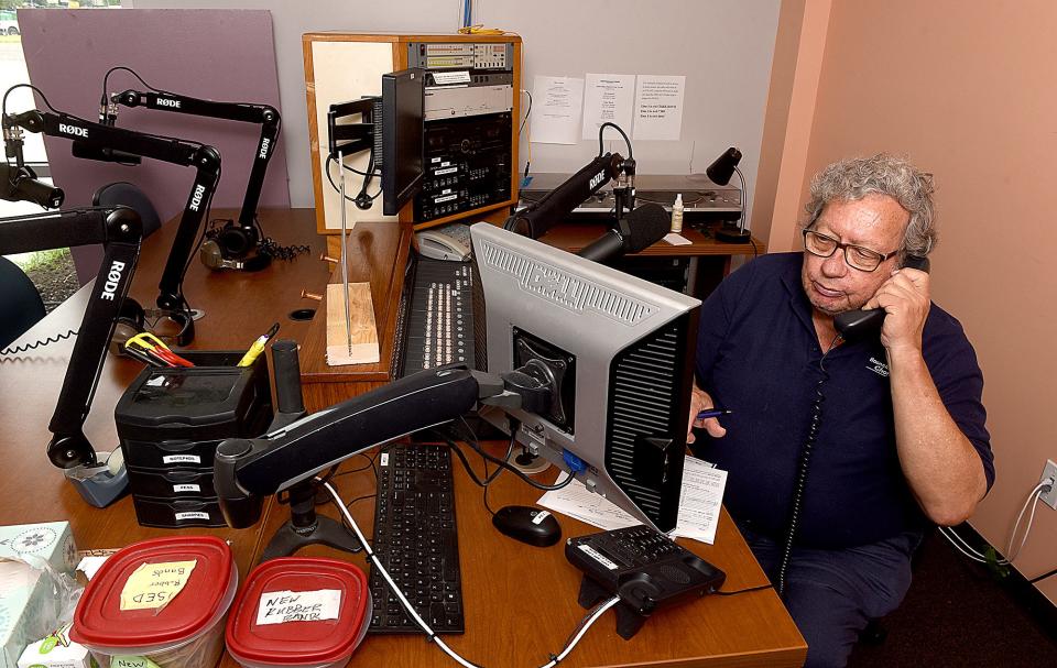 KOPN 89.5 FM Program Director Dennis Froeschner works in the new studio at 401 Bernadette Drive.