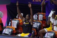 Los Angeles Lakers' Dwight Howard, celebrates late during the second half an NBA conference final playoff basketball game against the Denver Nuggets on Friday, Sept. 18, 2020, in Lake Buena Vista, Fla. (AP Photo/Mark J. Terrill)