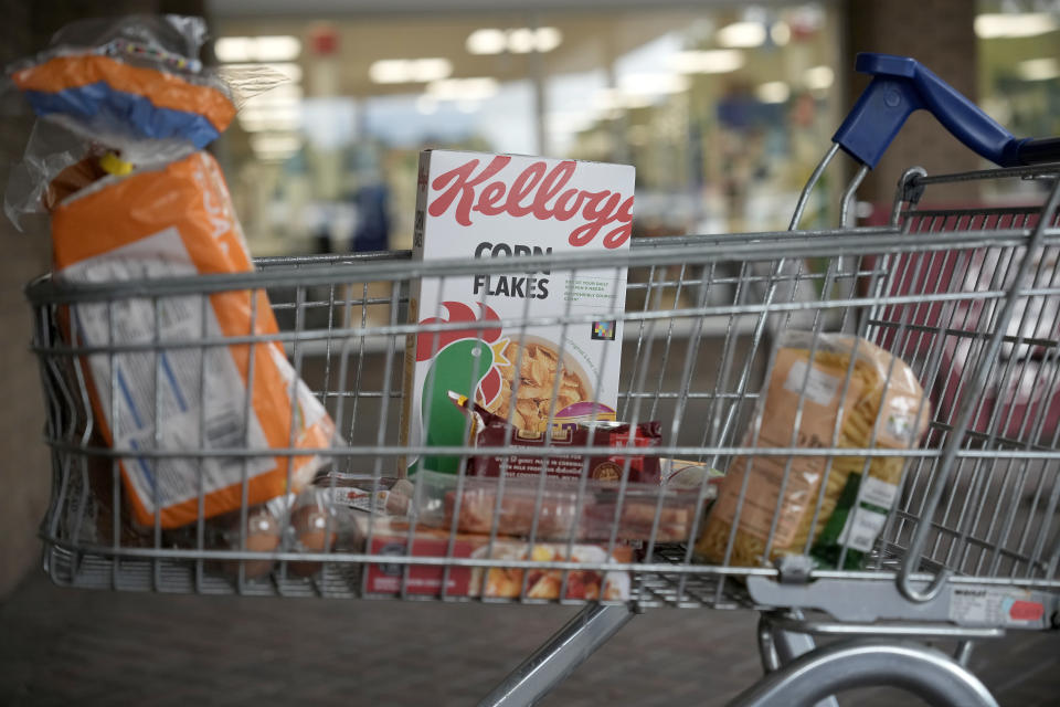 food NORTHWICH, ENGLAND - JULY 06: In this photo illustration a small selection of essential items sits in a shopping trolley on July 06, 2022 in Northwich, England. The British Retail Consortium recently said food manufacturers and supermarkets are having to pass on some of the cost of soaring raw materials to consumers, leading to the price of basic goods throughout the UK rising at the fastest pace since September 2008. Fresh food prices increased by 6% in the year to June 2022 coupled with an increase in inflation, and fuel and energy prices to create a cost of living crisis. This is leading to millions of low-income households going without essentials items, falling behind on bills and taking on debt. (Photo illustration by Christopher Furlong/Getty Images)